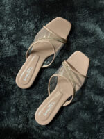 Elegant nude beige party wear sandals with transparent straps and rhinestone embellishments, perfect for weddings and special occasions.