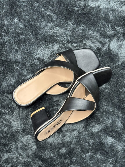 Black Criss-Cross Block Heel Sandals for women with a modern square toe and cushioned insole for comfort. Perfect for any occasion.